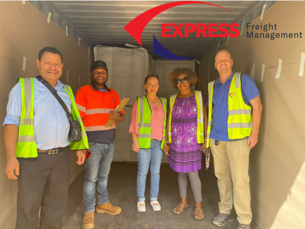 EFM crew standing in shipping containerEFM crew standing in shipping container – express freight management